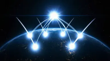 The six particle beams intensify and pulse in synchronized waves, the convergence bloom above the atmosphere swelling brighte